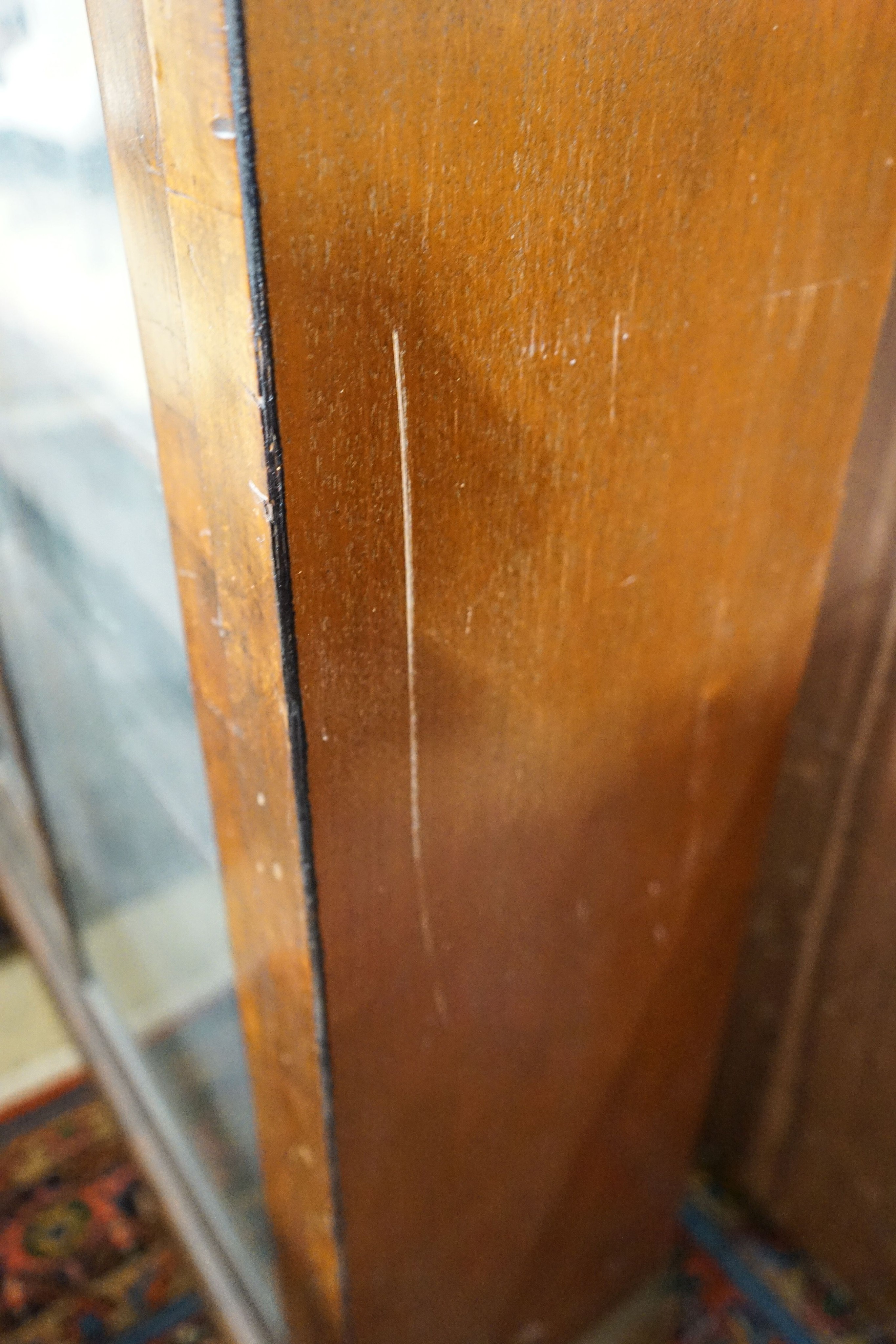 A Victorian mahogany sliding door glazed bookcase, length 130cm, depth 33cm, height 134cm